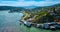 Racoon Strait around Tiburon city with houses on hillside wide aerial with Corinthian Yacht Club