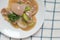 Rad Na, Famous Thai Chinese style wide rice noodle dish with tasty tender pork with thick gravy sauce. close up flat lay top view