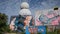 Radar domes on the roof of an anbandoned builing covered in graffiti on Teufelsberg, Berlin