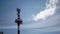 Radar Tower Beacon against the background of the blue sky in sunny day