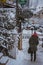 Radauti - Romania - 7th February 2020: Woman walking near a rest