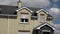 Radharc An Seascan, Meenmore, Dungloe, County Donegal, Ireland - May 30 2021 : The 2007 built houses sinking into the