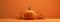 Radiant Autumn Elegance: A Gorgeous Orange Pumpkin Adorned with Fall Leaves Against a Warm Orange Backdrop AI generated
