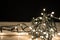 Radiant Christmas Lights: Festive Illumination on Retro Wooden Desk