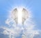 Radiant Guardian Angel Wings Blue Sky Background