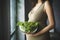 Radiant Pregnant smiling woman bowl salad. Generate Ai