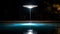 A radiant streetlamp casting a pool of light