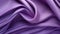 Radiant Waves: An Elegant Purple Fabric Backdrop with Fluid Patterns