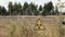 Radiation sign near forbidden Red Forest. A sign warning the nuclear risk in Chernobyl exclusion zone