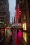 Radio City Music Hall reflected on a wet sidewalk, Manhattan, New York