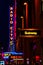 Radio City neon lights on a busy street in NYC