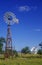 Radio telescope and old windmill at the National Radio Astronomy Observatory in Socorro, NM