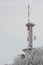 Radio and TV antenna covered with snow and ice