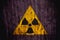 Radioactive ionizing radiation danger symbol painted on a massive concrete wall