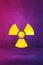 Radioactive symbol on a purple studio background