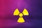 Radioactive symbol on a purple studio background