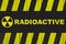 Radioactive warning sign with yellow and black stripes