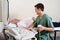 Radiologic Technician Smiling At Patient