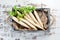 Radish Daikon in a wooden box. Radish. Vegetables.