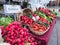 Radishes and peppers on display at Corvallis Farmers Market, Ore