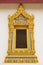 raditional thai style temple window. at Wat Yai Phitsanulok, Thailand.