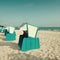 Ð¢raditional wooden beach chairs on the coast of Baltic Sea