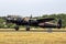 RAF Historical flight Avro Lancaster WW2 landing at Gilze-Rijen Airbase. The Netherlands - June 21, 2014