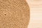 Raffia is an organic wood fiber that is easy to crochet on a wooden background