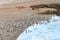 A Raft of Magellanic Penguin Walking on landing Beach. Punta Tombo reserve, Argentina