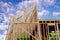 rafters and frame against the blue sky