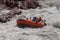 Rafting, brave and courageous people conquer water obstacles on a mountain river on rafts.