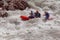 Rafting, brave and courageous people conquer water obstacles on a mountain river on rafts, along the river, in the spring.