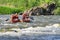 Rafting tourists with an experienced instructor on the river