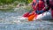 Rafting trip. Close up view of oars with splashes of water. The concept of teamwork, healthy lifestyle