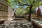 Rafts of water next to the famous fountain of the twelve pipes where the Murtigas river is born in Fuenteheridos, Huelva, Spain