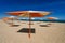 Rag parasols on the sandy beach