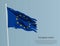 Ragged national flag of European Union. Wavy torn fabric on blue background