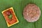 Ragi mudde with spicy red chutney on the banana leaf