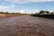 Raging river in Tucson, Arizona after heavy monsoon rain