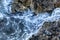 Raging sea on the rocky shore, close-up. Space for text