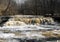 Raging spring waters of Great Gully Creek Lower Falls