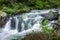 Raging torrent pouring out of Loch Morar