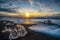 Raging waves smashing ice blocks at sunrise on Diamond Beach