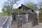 The rags are dried after washing against the background of a dilapidated house, slums and poor areas. Drying laundry