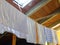 Rags and towels hung out to dry after washing in the attic