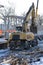 Rail excavator. Excavators machine excavate on railway. Construction of the underpass under the railway in winter. Russia