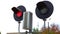 A rail road signal with one red light on white. Railway Traffic Signal Red Stop Light