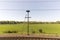 Rail Transportation Stopping Light Next To Agricultural Landscape