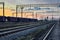 Railcar for dry cargo during beautiful sunset and colorful sky, railroad infrastructure, transportation and industrial concept