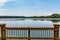 Railing of Fishing Pier with View of Stumpy Lake in Virginia Beach